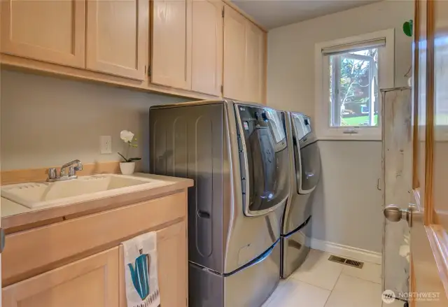 Large downstairs utility room with deluxe LG W/D