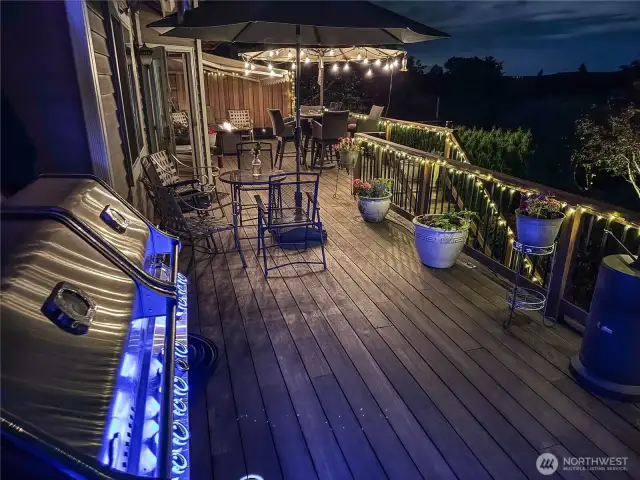 The entertaining deck is perfect during the day and better at night