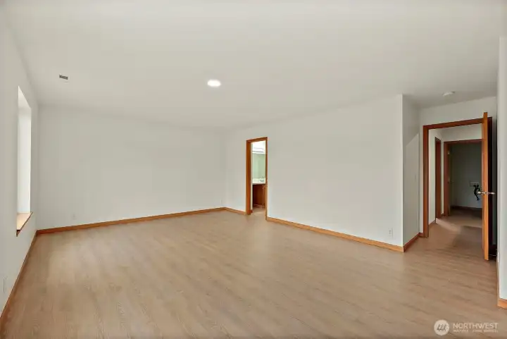 Primary suite with large walk-in and attached bathroom