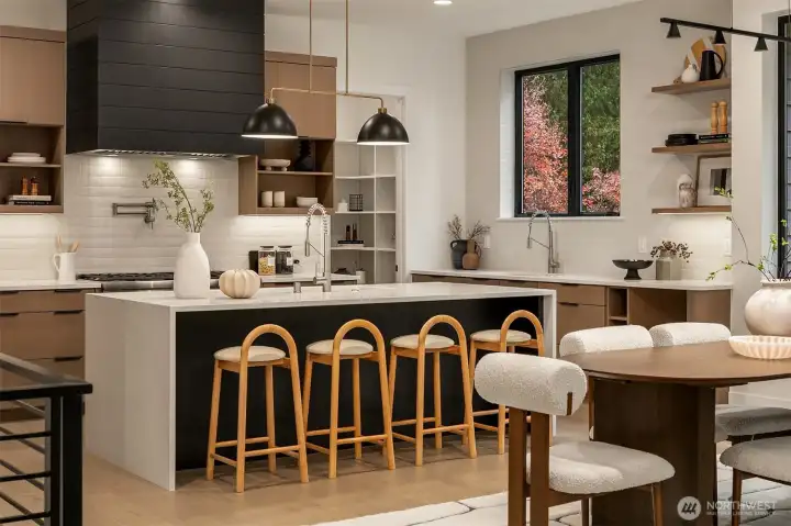 Step into a culinary dream with Thermador appliances, a 48-inch six-burner range, oak cabinets, walk-in pantry, and a quartz double-waterfall island that anchors the space.