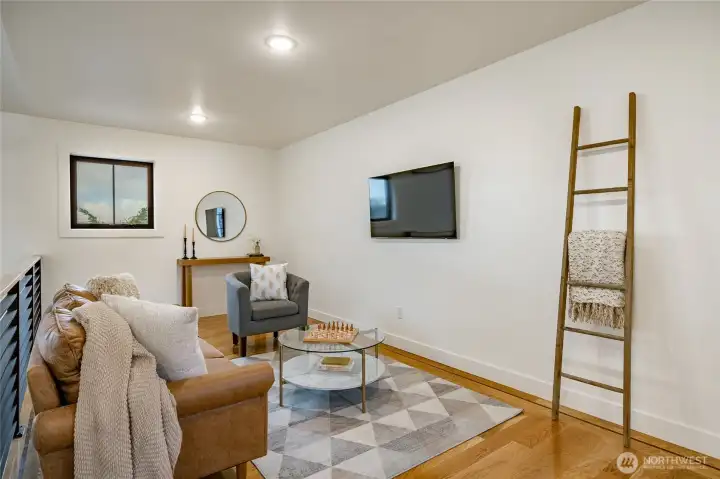 Upper level loft can host a number of uses. There are custom mounts for TV/video displays.