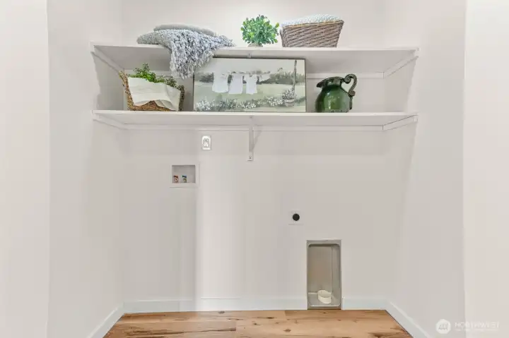 Perfectly placed laundry nook behind bifold doors