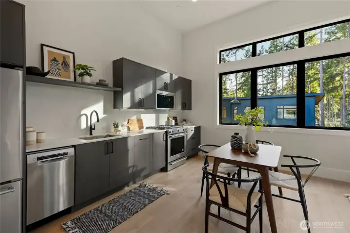 upstairs 2nd kitchen and guest suite with a separate entrance