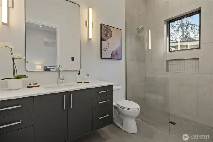 Studio guest suite ensuite 3/4 bath with heated tile floors