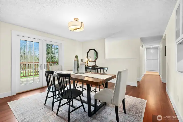 Opens to the deck and territorial views