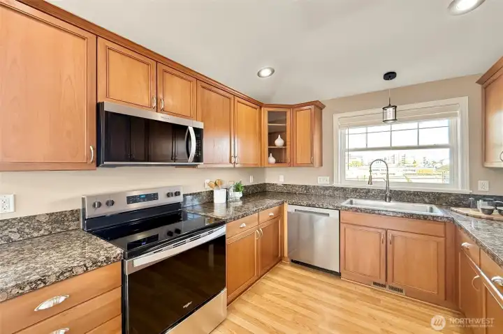 Well-appointed kitchen with stainless appliances and great storage