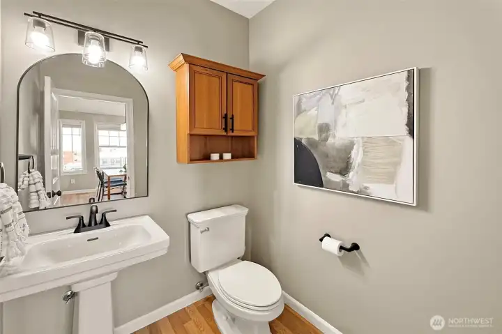 Stylish powder room off of the main level
