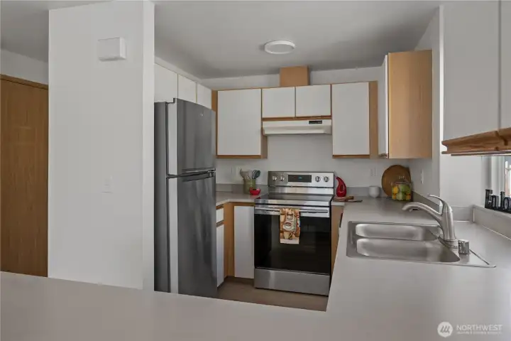 Plenty of cabinetry and new stainless appliances