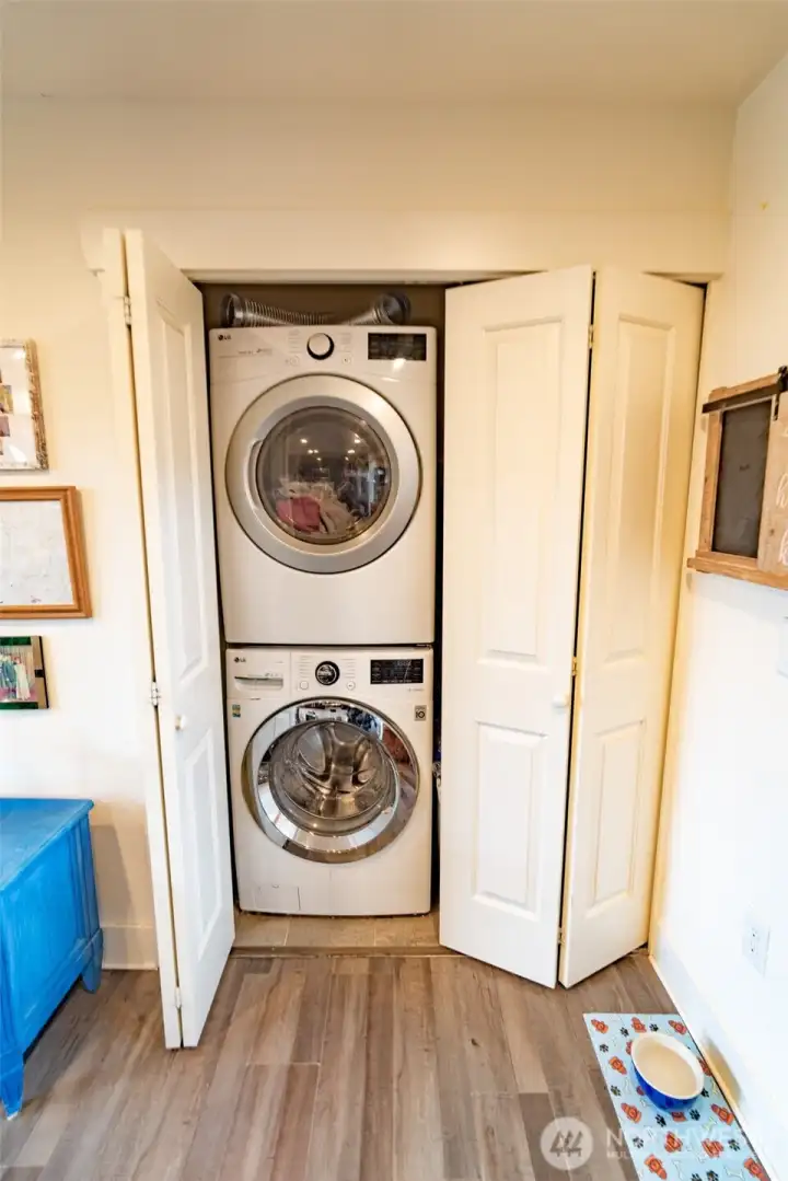 Laundry closet located in the kitchen area