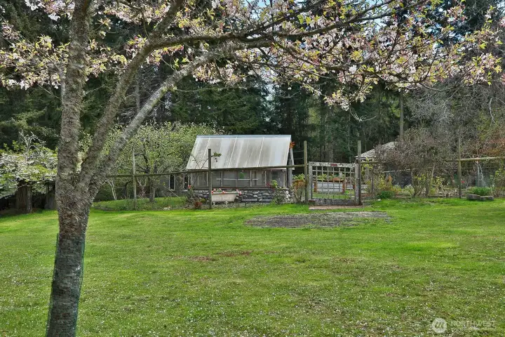 Greenhouse with fully fenced garden