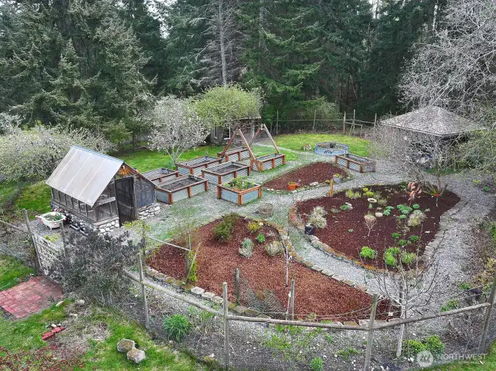 Chicken coop, raised beds and access to the well house