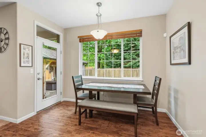 Dinning area off of the kitchen with access to the backyard