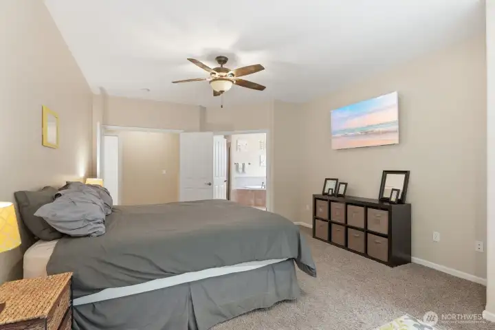 Main floor primary with double doors, large en suite and walk-in closet