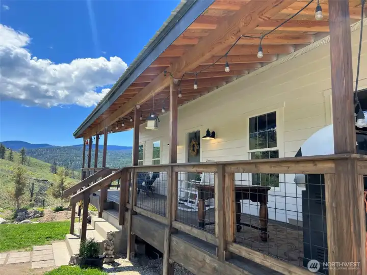 Covered front porch to enjoy views to the east. Covered front porch to enjoy views to the east.