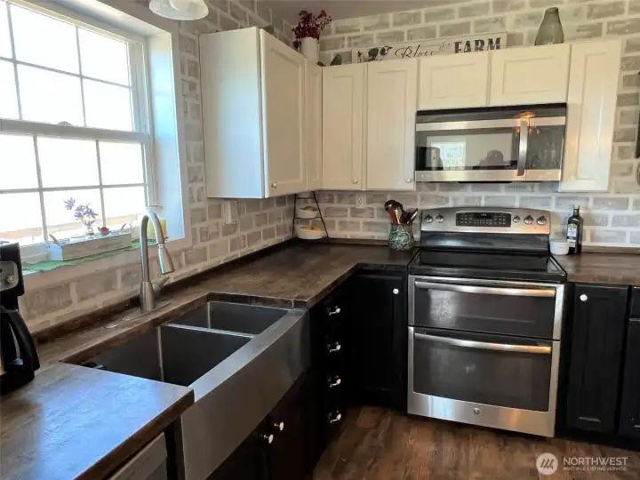 Chef's kitchen with plenty of counter space. Chef's kitchen with plenty of counter space.