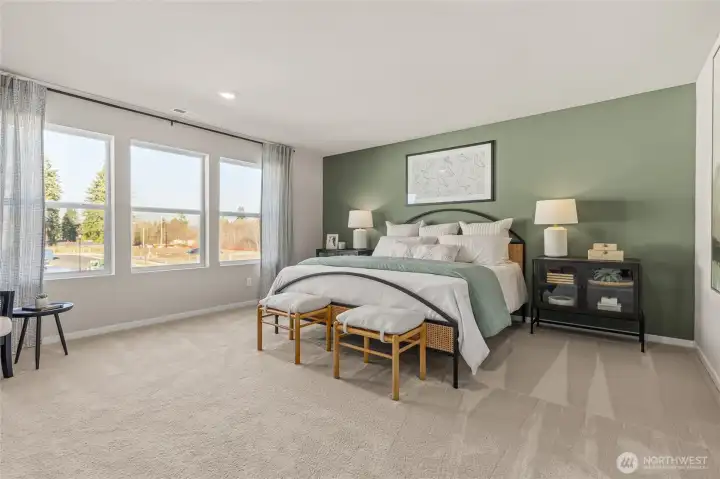 Massive primary bedroom easily accommodates King size mattress and more. Photo is representational. Actual home is under construction and colors, materials, and finishes may vary. See site agent for details. Massive primary bedroom easily accommodates King size mattress and more. Photo is representational. Actual home is under construction and colors, materials, and finishes may vary. See site agent for details.