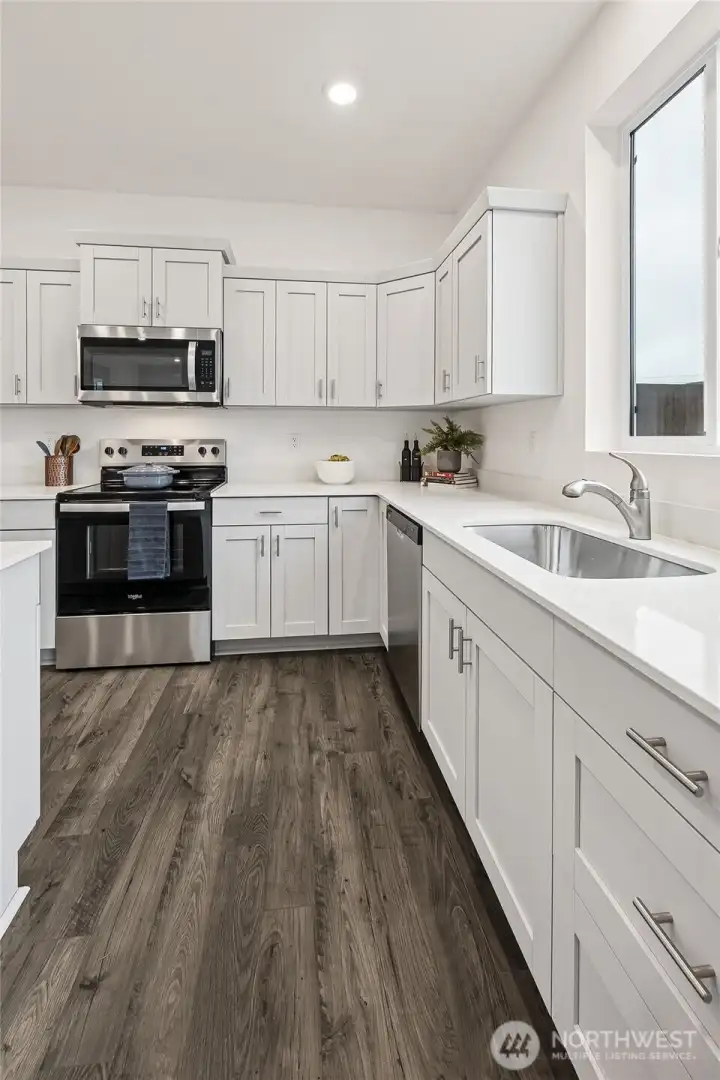Large butcher style undermount sink in the kitchen. Photo is representational. Actual home is under construction and colors, materials, and finishes may vary. See site agent for details. Large butcher style undermount sink in the kitchen. Photo is representational. Actual home is under construction and colors, materials, and finishes may vary. See site agent for details.