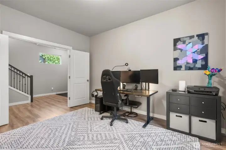 The downstairs room is perfect for a Den, Office, or Guest Suite.