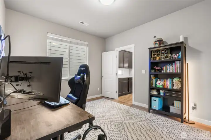 With kitchen access, a special ordered oversize window, and double doors, this space was intentionally designed to be used as a guest Room.