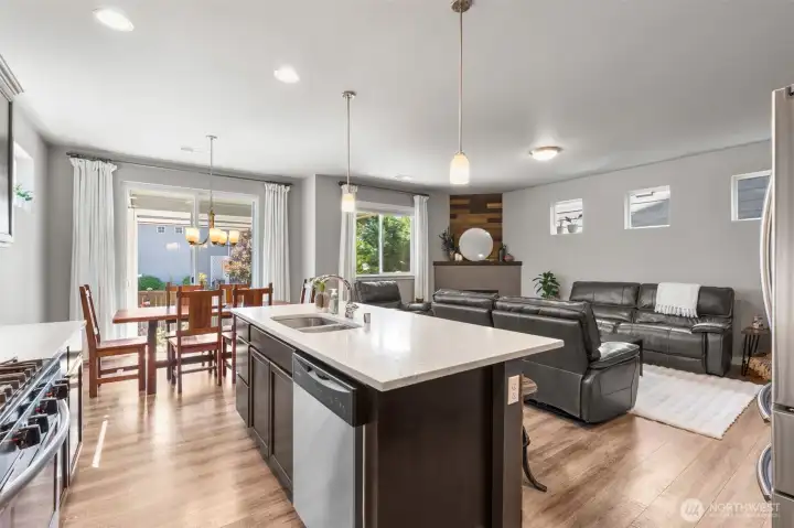 The open-concept Great Room, Dining, and Kitchen make entertaining easy.
