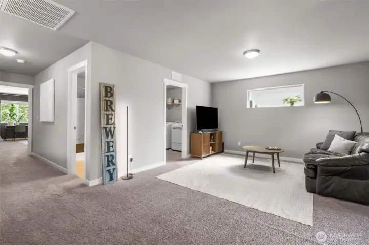 Upstairs the flex space offers an additional hangout space to relax.