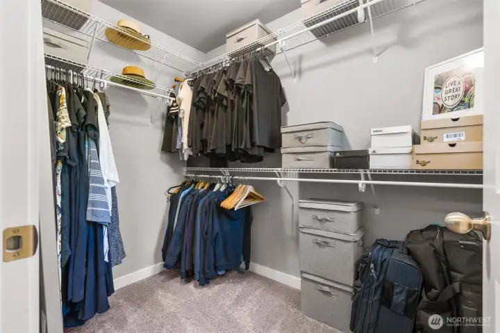 Good Sized walk in closet, lit by its very own window create a storage space that doesn't feel cramped.