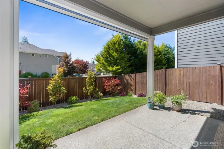 Enjoy outdoor living on the covered back patio, with space to relax alone, or invite friends.