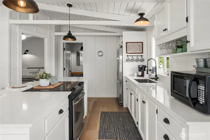Open and spacious kitchen with vaulted ceilings.