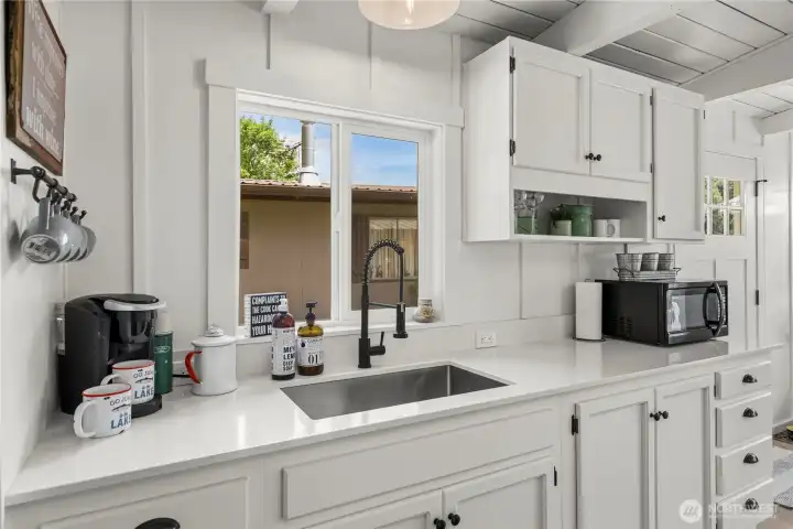 Fully updated and adorable kitchen with undermount sink.