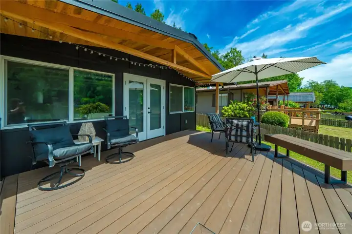 Brand new deck with built in benches and covered porch for some shade.