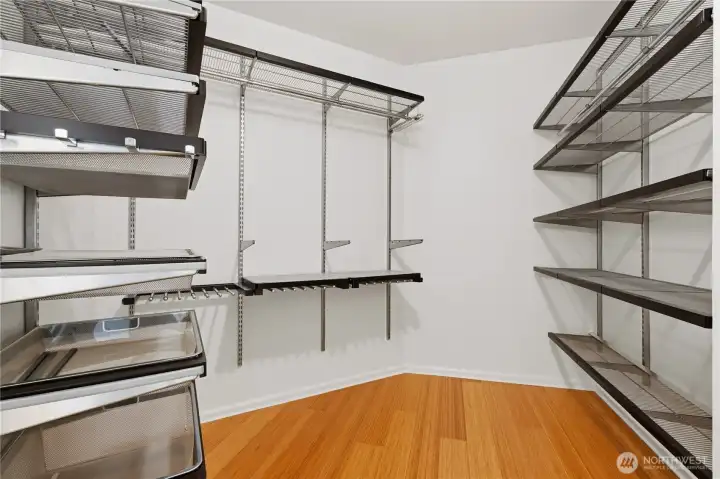 Primary walk-in closet Primary walk-in closet