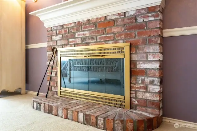 Another view of the family room's gas fireplace.