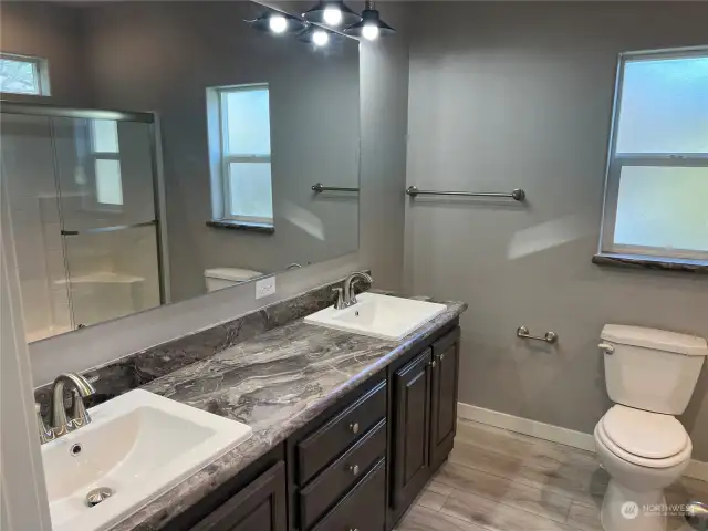 Primary bath with double vanities.