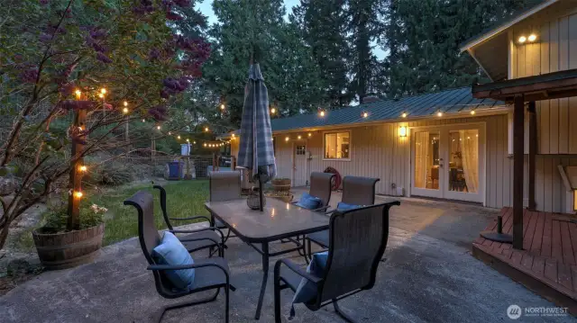 Step outside and enjoy seamless indoor-outdoor living with an extended patio and inviting seating area.