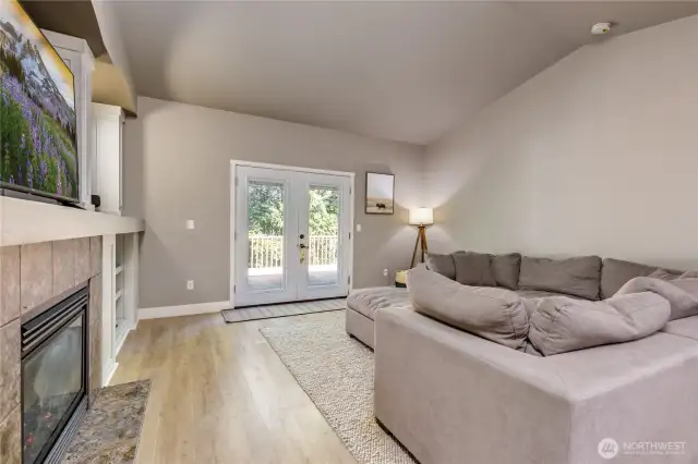 French doors lead to the large back deck