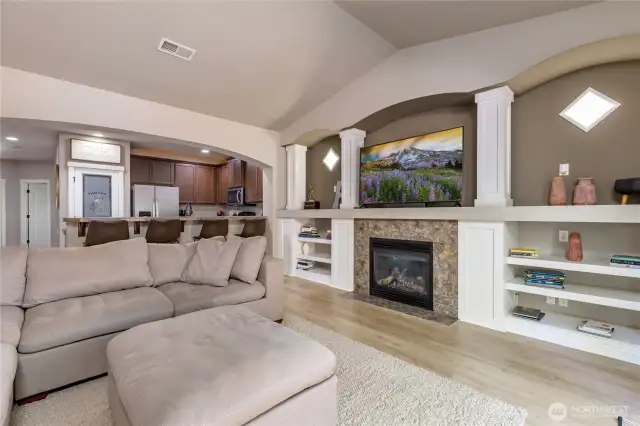 Beautiful gas fireplace and built-in shelving