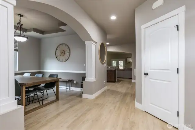 Entry view. Beautiful and low-maintenance LVP flooring throughout most of the home.