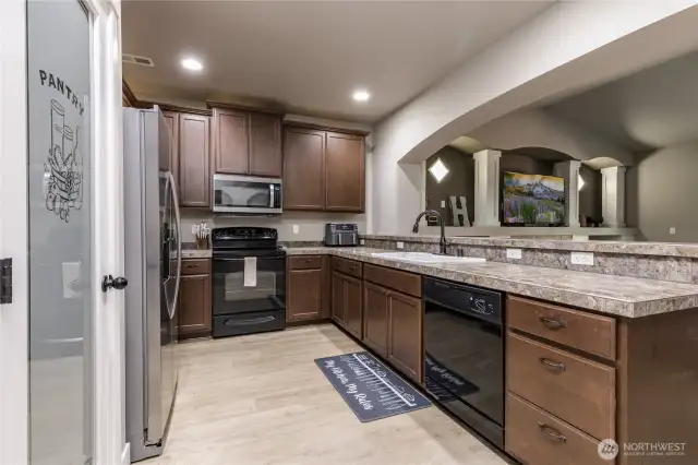 Generous kitchen with lots of counter space and a nice pantry