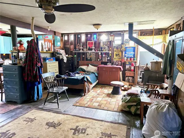 Living space. The owner had an electrical system put together which connects to the generator outside. It would be quick and relatively inexpensive to connect the home to metered electrical service.