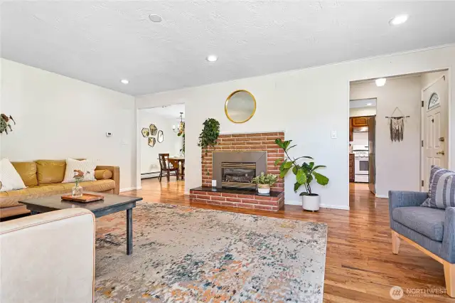 Living room opens to kitchen & dining area.