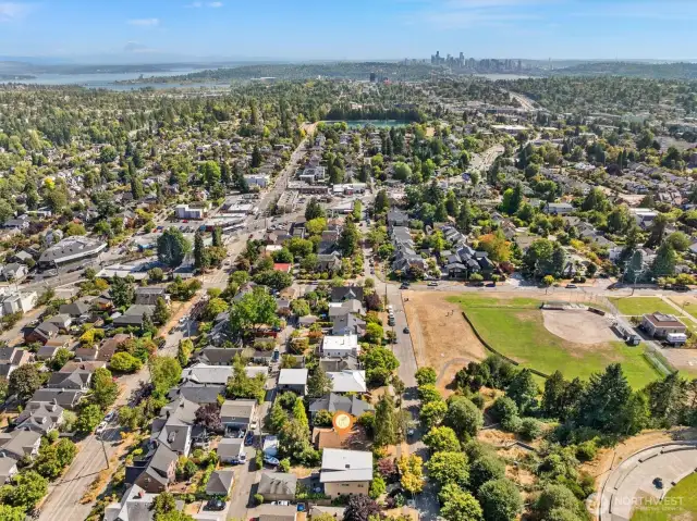 Aerial photo looking south. From this photo you can see downtown Seattle. Coveted Maple Leaf neighborhood. Only minutes to UW, Children's, downtown, Amazon and 520. Walking distance to light rail, cafes, restaurants and grocery stores.