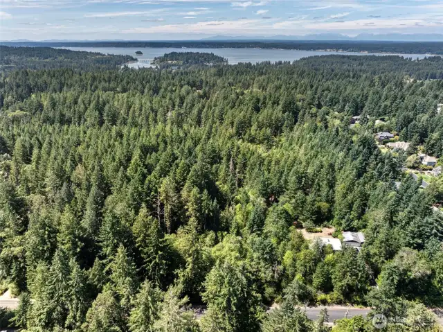 Aerial view of Parcel A & Parcel B (listed separately).  Parcel A is 1.55 acres with roughly 174 feet of road frontage.  Parcel B is 2.47 acres, mostly level. Can be bought separately or together for an estate setting.