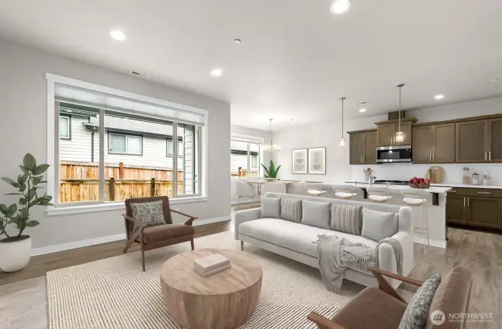 Virtually staged living, kitchen and dining room.