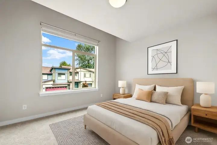 Virtually staged bedroom (2 of 3 upstairs).