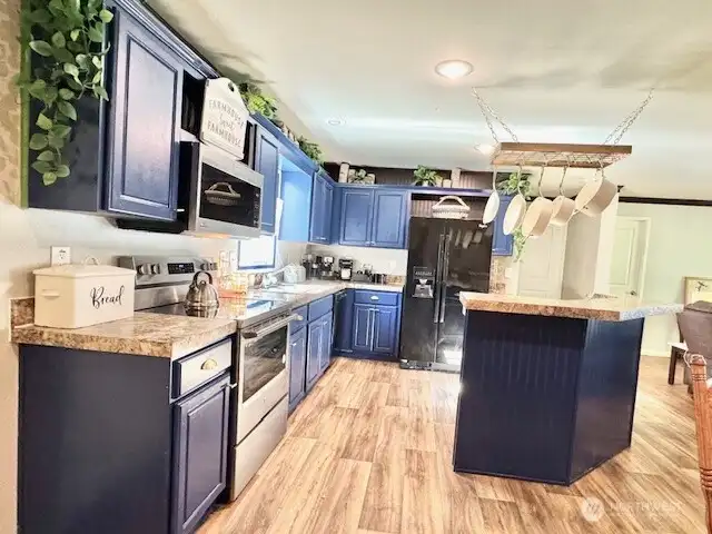 Main kitchen with stainless steel appliances
