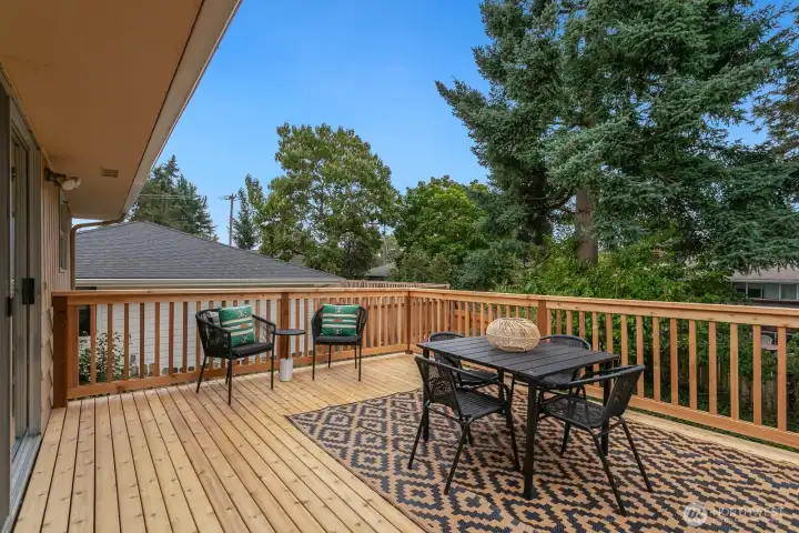 Brand new spacious back deck off kitchen and dining area.