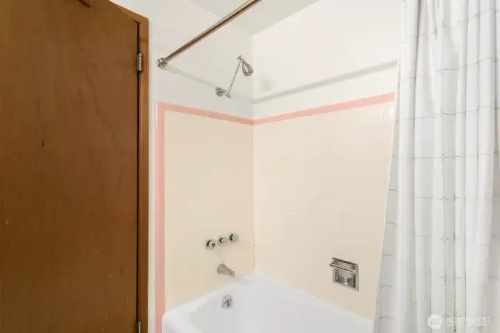 New lighting, paint and refinished tub.
