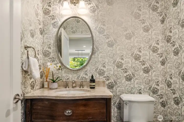Powder room with wallpaper