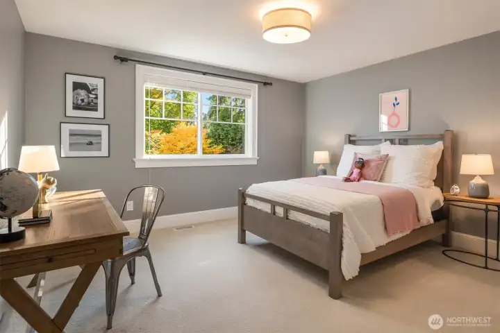 Two additional bedrooms on the upper level.