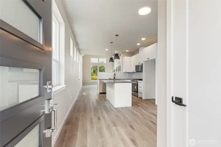 Kitchen & entry pic for reference of like unit. 555 Northview is under construction.